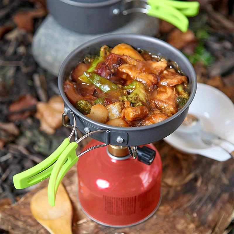 Black outdoor camping cookware, camping pots and pans, outdoor cooking utensils, compact cookware set, durable cookware, Australian camping gear, camp stove cookware, portable cooking set