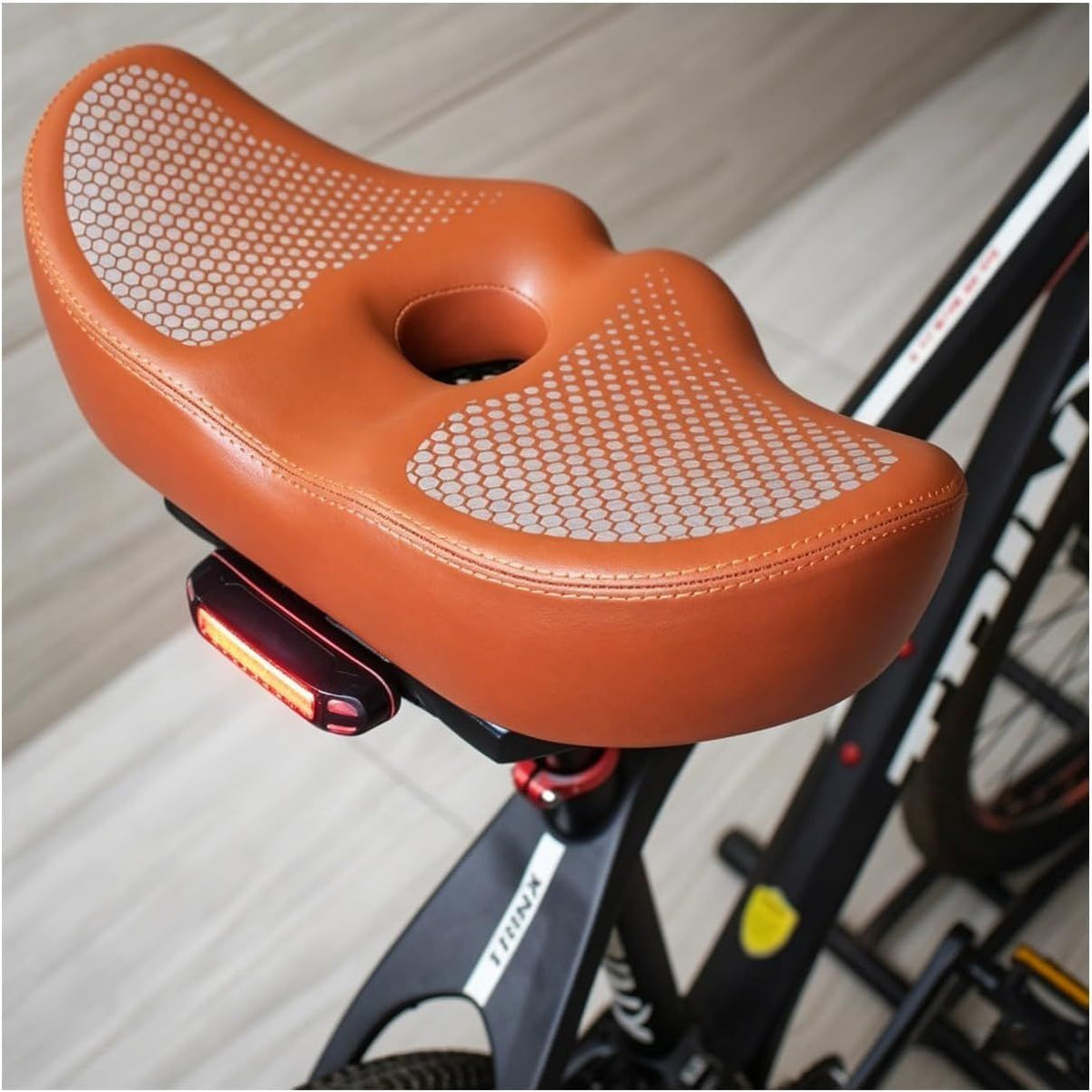 Noseless Bike Seat Wide,Padded Bike Seat for Men and Women,Bike Accessories
Memory Foam Padding Dual Shock Balls and Center Vent for Mountain Bike Exercise Bike Electric Bike(Orange)